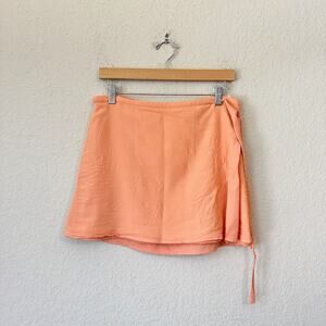 ARITZIA SUNDAY BEST Wrap Mini Skirt Coral Orange City Travel Minimalist